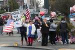 Honks, waves, flags and flowers for Everett’s tattooed patriot