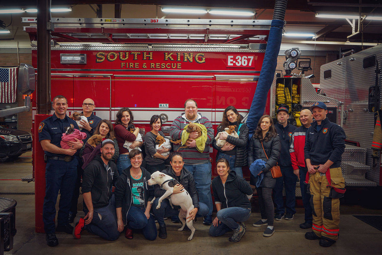 South King firefighters, Resilient Hearts Animal Sanctuary members, volunteers and friends pose for a photo at the Jan. 8 homecoming. Photo courtesy of Gordon Fox