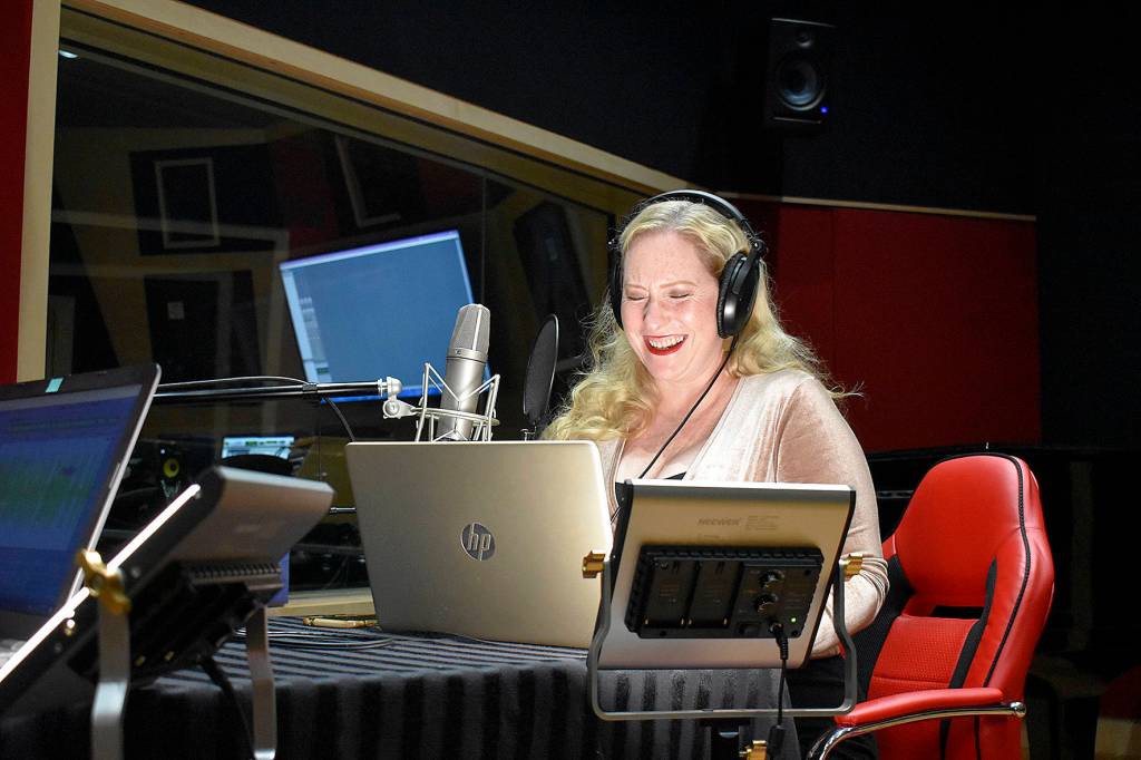 Photo by Haley Ausbun. Carolyn Ossorio, a former Renton Reporter columnist, recently launched a true crime podcast that features terrifying tales from the Pacific Northwest in the first season.