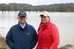 Elbridge Stuart and Rosy Smit stand in front of Carnation Farms flooded fields on Feb. 7, 2020. Its the fifth flood this year along the Snoqualmie River that has broken 56 feet. Aaron Kunkler/staff photo