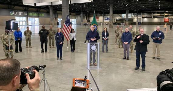 Gov. Jay Inslee is pictured March 28 at a field hospital set up at the CenturyLink Field Event Center to address non-COVID-19 medical needs. (Photo courtesy of Jay Inslees Twitter feed)