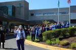 St. Francis staff cheer and wave as the final vehicle in the parade drove away. Olivia Sullivan/staff photo