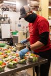 Dan Kiley, executive chef at Lisa Dupar Catering, prepares Mediterranean salads for Medic One Foundations Gratitude Meals program. Photo courtesy of Hannah Sheil