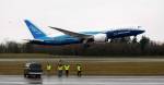 Workers cheer and wave as Boeings 787 Dreamliner takes off from Paine Field on Dec. 15, 2009. (Justin Best/ Herald file)