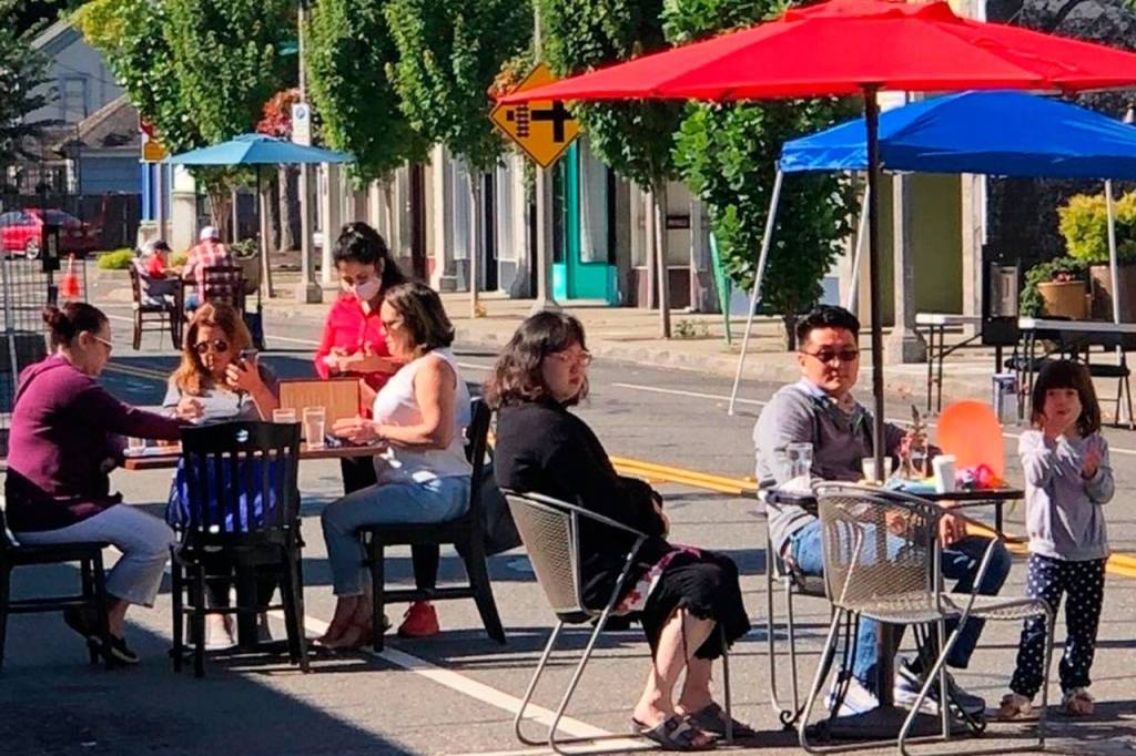 Last summer, people took advantage of the outdoor dining along First Avenue between Gowe and Titus streets in downtown Kent. In Phase 2 of the governors reopening plan, which was announced Jan. 28, restaurants can reopen at a maximum 25% capacity and a limit of six people per table. Photo courtesy of Kent Downtown Partnership