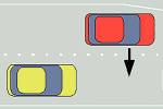 In a zipper merge, cars continue in their lanes and then take turns at the point where the lanes meet. (Koenb via Wikimedia Commons)