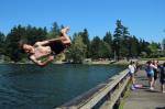 Fedor Osipov, 15, flips into Steel Lake in Federal Way on June 28. Olivia Sullivan/Sound Publishing