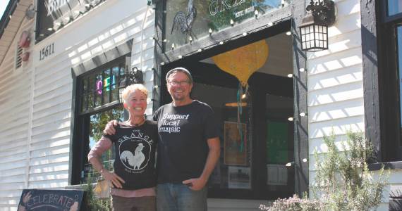 Co-owners Sarah Cassidy and Luke Woodward stand in front of The Grange (photo by Cameron Sheppard)