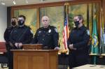 James Aquirre (middle left) being sworn in by Police Chief Perry Phipps (middle right) at a city council meeting on Aug. 9, 2021. File photo by Conor Wilson/Valley Record.