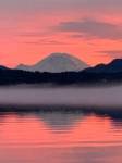 Photo courtesy of Abbie Crane, who writes that on Jan. 12, 2022, I walked on the East Lake Sammamish Trail at about 4:30 p.m. The combination of a colorful, beautiful sunset and a bank of fog on the lake made these pictures very special. Mt. Rainier made an appearance.