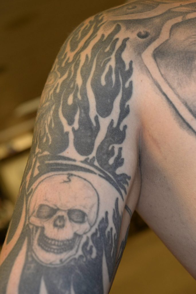Photo of Auburn Police officer Jeffrey Nelsons tattoos. A King County Superior Court Judge decided many of Nelsons tattoos contained wording or imaging that would prejudice potential jurors. An additional 40 images have to be redacted prior to being released. (Courtesy photo)
