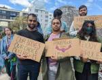 A group holds signs at the reproductive rights protest on May 14, 2022 at Cal Anderson Park. Hannah Saunders/Sound Publishing