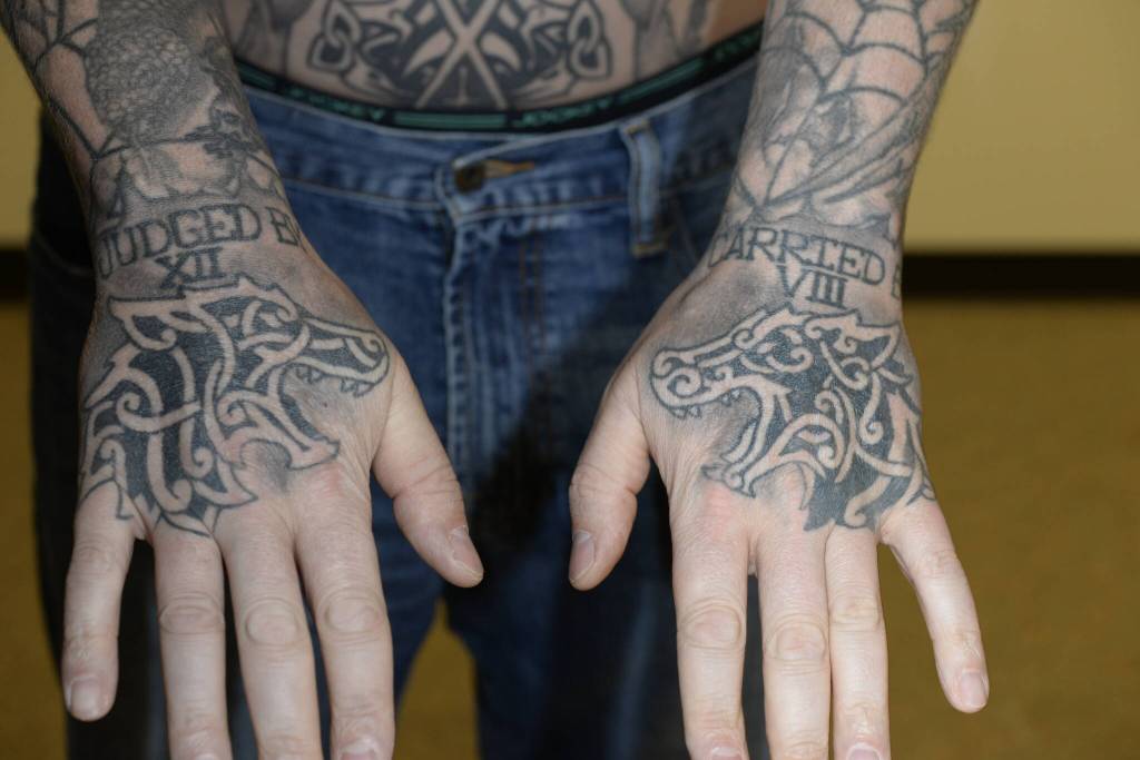 Photo of Auburn Police officer Jeffrey Nelsons tattoos. A King County Superior Court Judge decided many of Nelsons tattoos contained wording or imaging that would prejudice potential jurors. An additional 40 images have to be redacted prior to being released. (Courtesy photo)