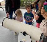 Kids looking through telescope at Edwin E. Ritchie Observatory in Bainbridge Island, WA. Photo courtesy of Battle Point Astronomical Association.