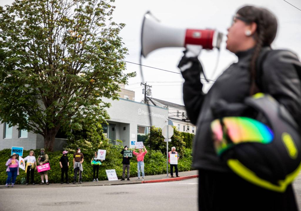 Abortion rights protesters fill all four corners of the intersection in front of the Everett Planned Parenthood in support of abortion rights on Saturday, July 9, 2022 (Olivia Vanni / Sound Publishing)