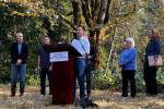 U.S. Transportation Secretary Pete Buttigieg makes statements regarding federal grant money available for fish culvert restoration. (Photo by Cameron Sheppard/Sound Publishing)