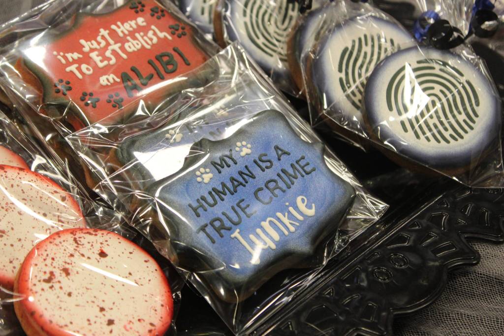 Along with vendor booths that showcase Pacific Northwest cryptids, spooky nostalgia, podcast merchandise and witchcraft items, true crime-related wares were on display with everything from pencils printed with murder statistics and homemade dog cookies. Photo by Bailey Jo Josie/Sound Publishing.