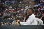 Ken Griffey Jr. in the dugout talking with the MLB Network broadcast of the HBCU Classic.