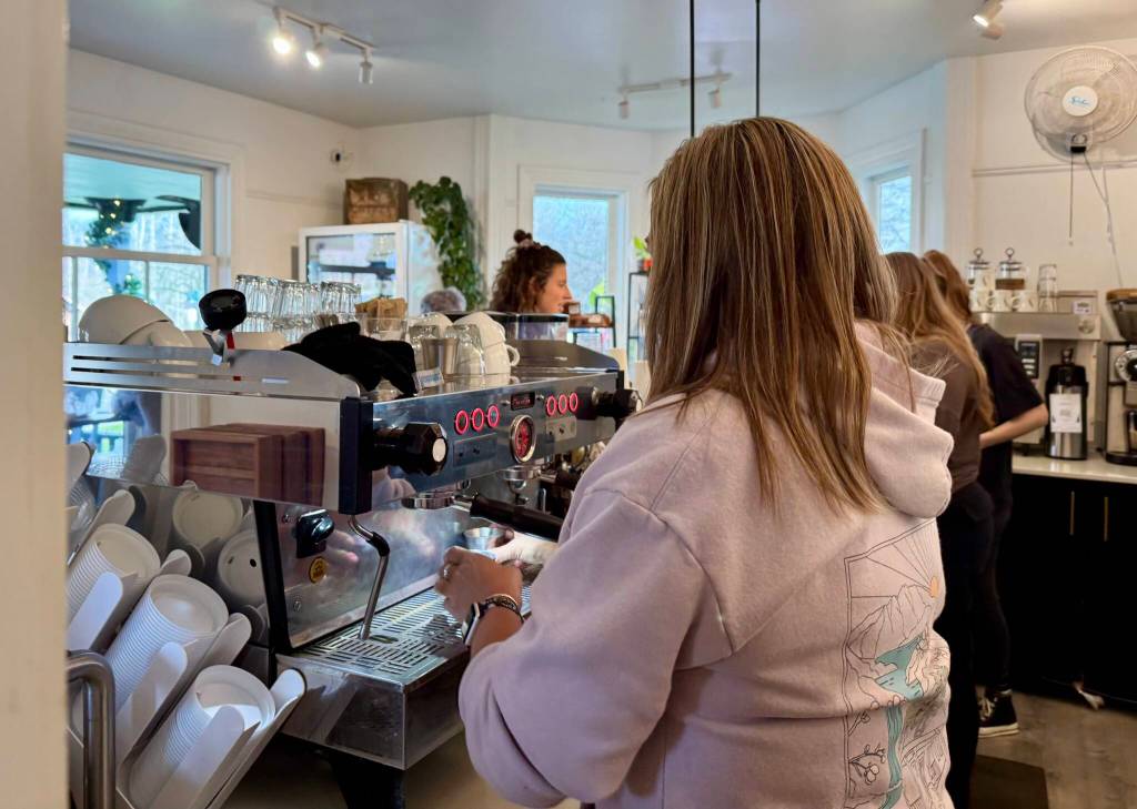 A barista makes espresso at Fall Citys Aroma Coffee Co. Jan. 14, 2025. (Grace Gorenflo/Valley Record)