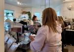 A barista makes espresso at Fall Citys Aroma Coffee Co. Jan. 14, 2025. (Grace Gorenflo/Valley Record)