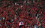SEATTLE, WASHINGTON - JUNE 17: Fans of Urawa Red Diamonds react, enjoying the match atmosphere during the FIFA Club World Cup 2025 group E match between CA River Plate and Urawa Red Diamonds at Lumen Field on June 17, 2025 in Seattle, Washington. (Photo by Steph Chambers - FIFA/FIFA via Getty Images)