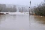 NE 124th Street, one of the two roads that takes Duvall residents across the river and quickly out of the Snoqualmie Valley, was closed due to flood water, Dec. 10, 2025. Photo by Grace Gorenflo/Sound Publishing