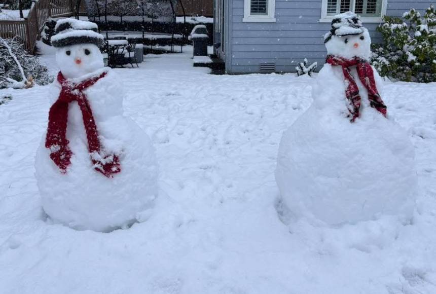 <p>A pair of people made of snow in Snoqualmie on March 13. Photo courtesy of Kari Wahlstrom Collins</p>