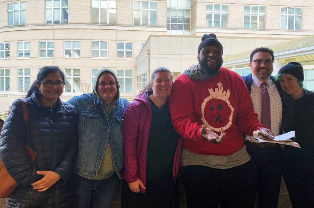 The DAndre Glapsy defense team, from left to right: Attorney Anna Samuel, investigator Emily Willard, social worker Alix Willard, DAndre Glaspy, attorney Michael Schueler and investigator Molly Gilbert. COURTESY PHOTO/Michael Schueler