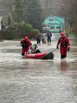 Snoqualmie firefighters rescue residents after their home flooded, Dec. 10, 2025. Photo courtesy of the city of Snoqualmie