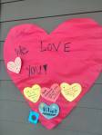 In the following photos, community members placed notes and flowers at a memorial for Eliot Abramson at the Mercer Island High School stadium. Staff photos by Andy Nystrom