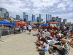 Fans sit and watch at Pier 62 as Belgium and Egypt play. Ben Ray / The Reporter