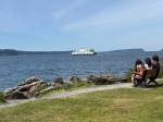 People watch the ferry from Mukilteo Lighthouse Park. Photo courtesy of Mindy Stern