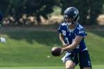 Sam Darnold hands the ball off during training camp. Photo provided by Maria Dorsten